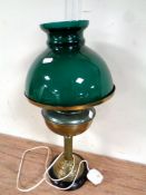 An antique style paraffin table lamp converted