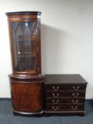 An inlaid mahogany five drawer chest together with a similar corner unit