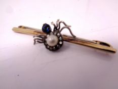 A 9ct gold spider brooch.