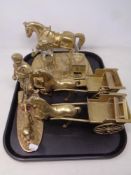 A tray of brass ornaments,