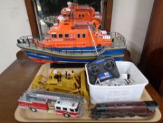 A tray of die cast vehicles, locomotive engine,