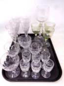 A tray of crystal and glass including champagne flutes