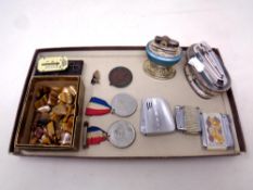 A tray of commemorative medals,