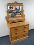 An Edwardian satin wood four drawer chest