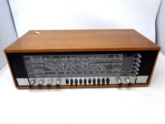 A pair of teak cased Wharfedale speakers together with an Arena radio model T-2500H