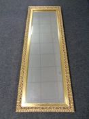 A gilt framed hall mirror