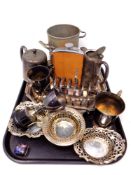 A tray of silver plated items including dishes, toast rack,