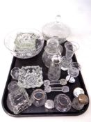 A tray of crystal and glass, dishes, knife rests,