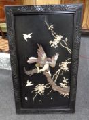 A Japanese black lacquered wall panel depicting and eagle on branch