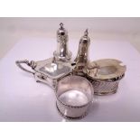 A silver napkin ring together with 2 silver mustard pots and 2 silver pepperettes (5)
