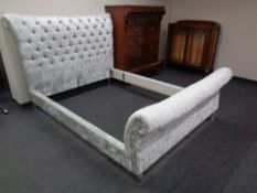 A contemporary 6' bed frame upholstered in buttoned velvet fabric (Af)