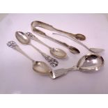 A small quantity of silver cutlery including caddy spoon, sugar tongs, teaspoons, 103.3g.