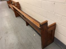 A pitch pine church pew, length 296 cm.