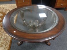 A good quality Barker and Stonehouse circular coffee table with glass inset top