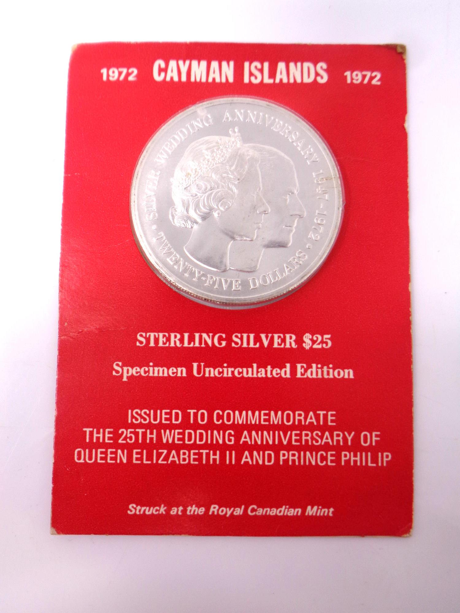 A Cayman Islands sterling silver uncirculated commemorative 25 dollar coin.