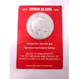 A Cayman Islands sterling silver uncirculated commemorative 25 dollar coin.