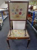 An Edwardian tapestry fire screen together with an Edwardian dressing table stool