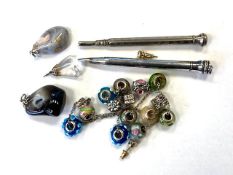 A small quantity of charms, propelling pencils, pendant etc.