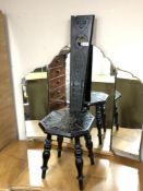 An Edwardian carved ebonised spinning chair
