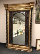 A good quality colonial style mirror with pillared sides 121 cm x 199 cm
