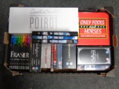 A box containing DVD and Blu ray box sets to include Porridge, Frasier, Game Of Thrones,