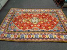 An eastern design polychrome rug