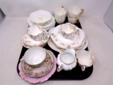 A tray containing part antique Foley and Coalport bone china tea services,