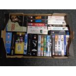 A box containing DVD and Blu Ray box sets to include Prison break, The Bourne collection,