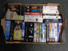 A box containing DVD and Blu Ray box sets to include Prison break, The Bourne collection,