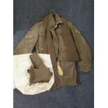 A vintage British Army corporal's two-piece uniform together with two woolen scarves and a canvas