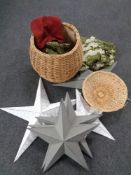A box containing six contemporary metal star wall hangings together with a lidded wicker basket