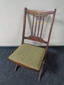 A Edwardian mahogany folding chair