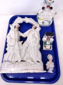 A tray of Staffordshire flat backed figure of two gentleman, together with a bud vase,