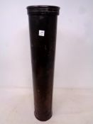 An early 20th century copper cylindrical tube with screw cap lid