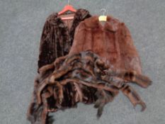 A fox fur coat together with two stoles,