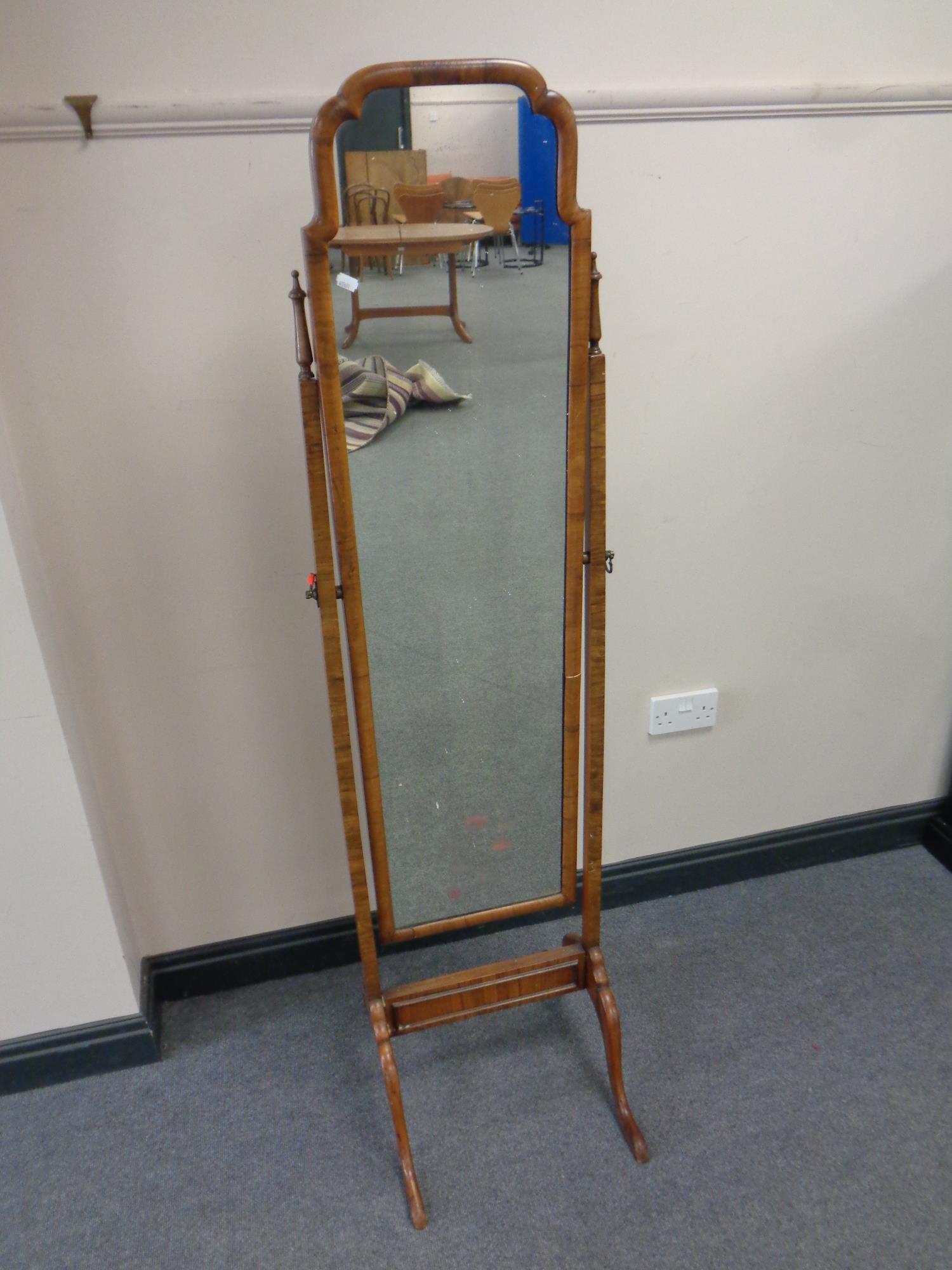 A 19th century walnut framed cheval mirror