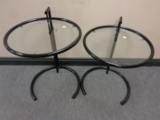 A pair of Eileen Grey tubular metal and glass adjustable occasional tables