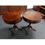 A pair of Regency style inlaid mahogany pedestal drum tables