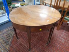 A 19th century inlaid mahogany circular dining table