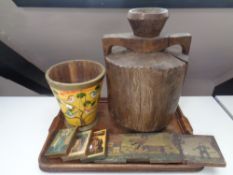 An Edwardian oak twin handled serving tray together with further wooden items to include religious