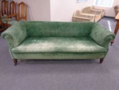 A Victorian Chesterfield settee upholstered in a green dralon