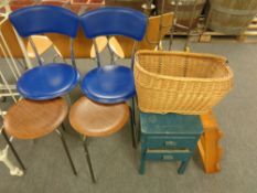 A pair of blue vinyl and tubular metal dining chairs,