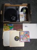 A box containing Aiwa turntable, Beatles DVD box sets,