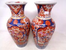 A pair of Japanese Imari vases.