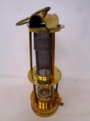 A reproduction E William Thomas brass miners lamp
