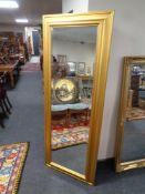 A gilt framed bevel edged hall mirror