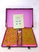 A 20th century cased Mahjong set