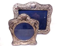 Two silver photograph frames