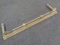 A 19th century brass fire fender