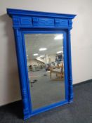 A 19th century blue-painted hall mirror with pillar column supports